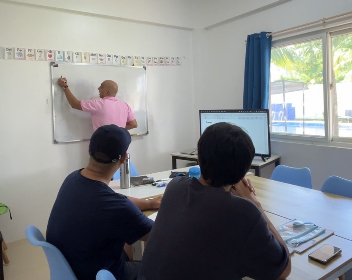 Teacher teaching Business English Course to International Students