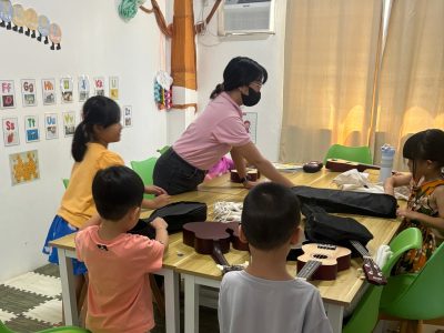 Teacher teaching Students in her Kinder Class