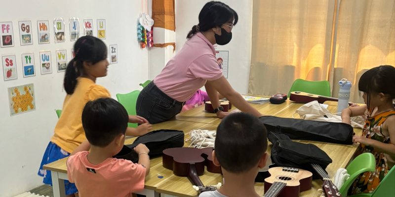 Teacher teaching Students in her Kinder Class